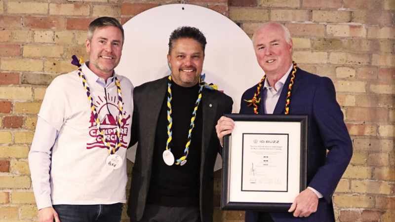 Three men standing together