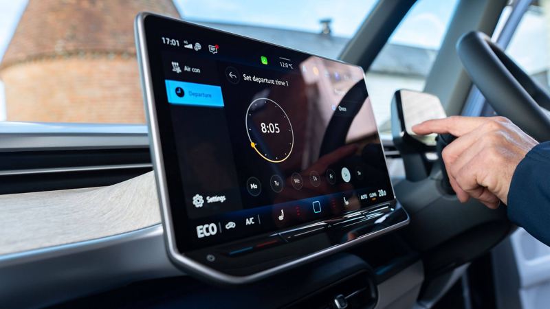 Internal photo of an ID. Buzz cockpit showing a person using a dashboard module. 