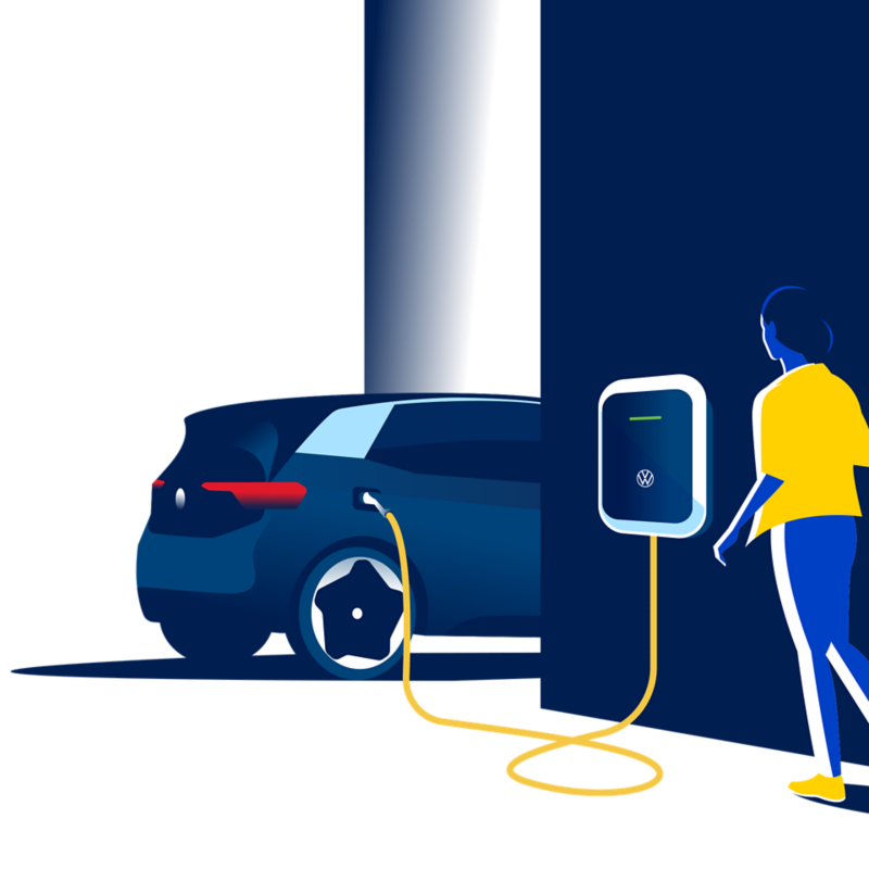 Una persona se acerca al cargador de coches eléctricos Wallbox y al ID.3 en Canarias