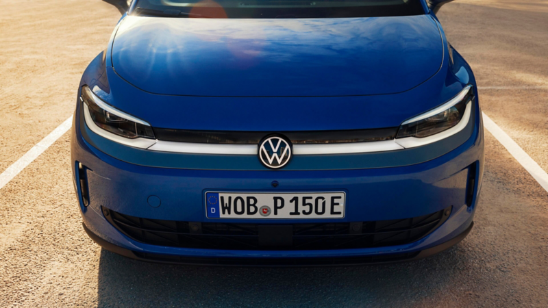 Front view of a blue VW ID. Polo, showing the LED headlights and hood.