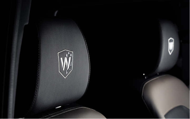 Close up of Walkinshaw Logo on drivers head rest