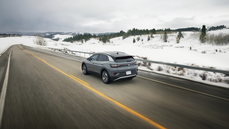 The 2024 Volkswagen ID.4 driving on the highway in the winter