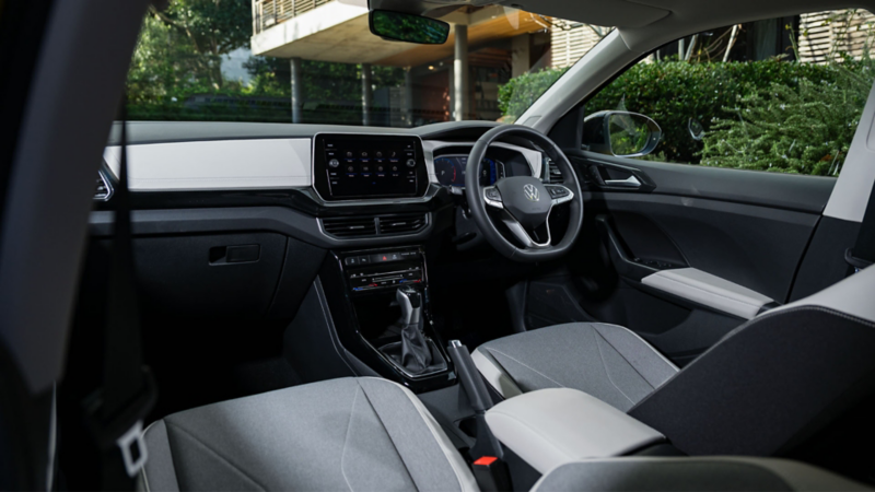 View of the cockpit through the passenger window.