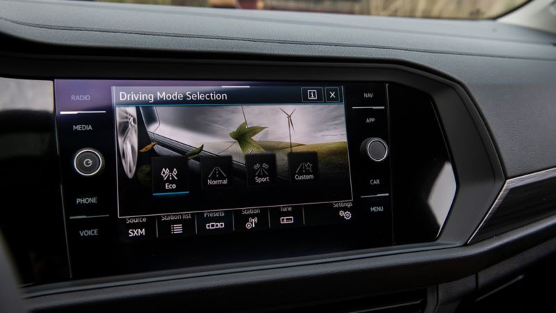 A close-up of the 2023 Jetta touchscreen with a drive mode selection.