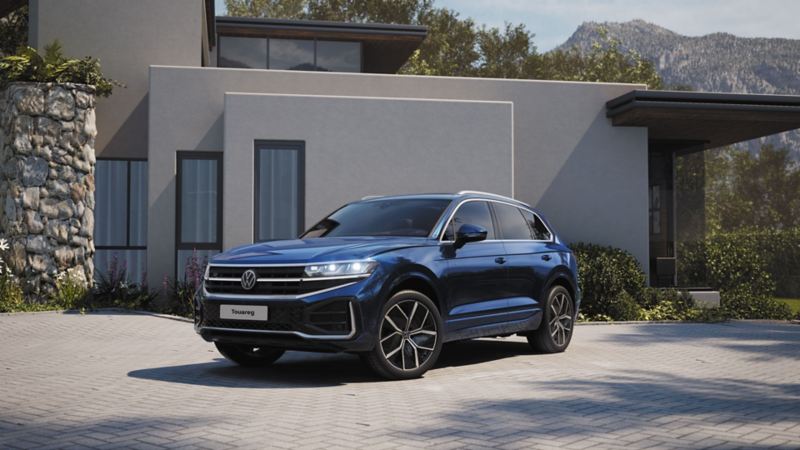 The New Touareg parked in front of a house