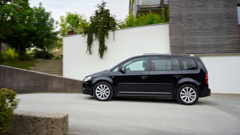 VW previous model drives on the road – MPV