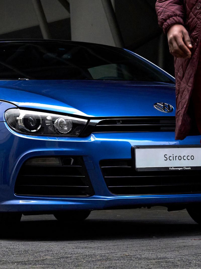 A man and his used compact class VW Scirocco 3