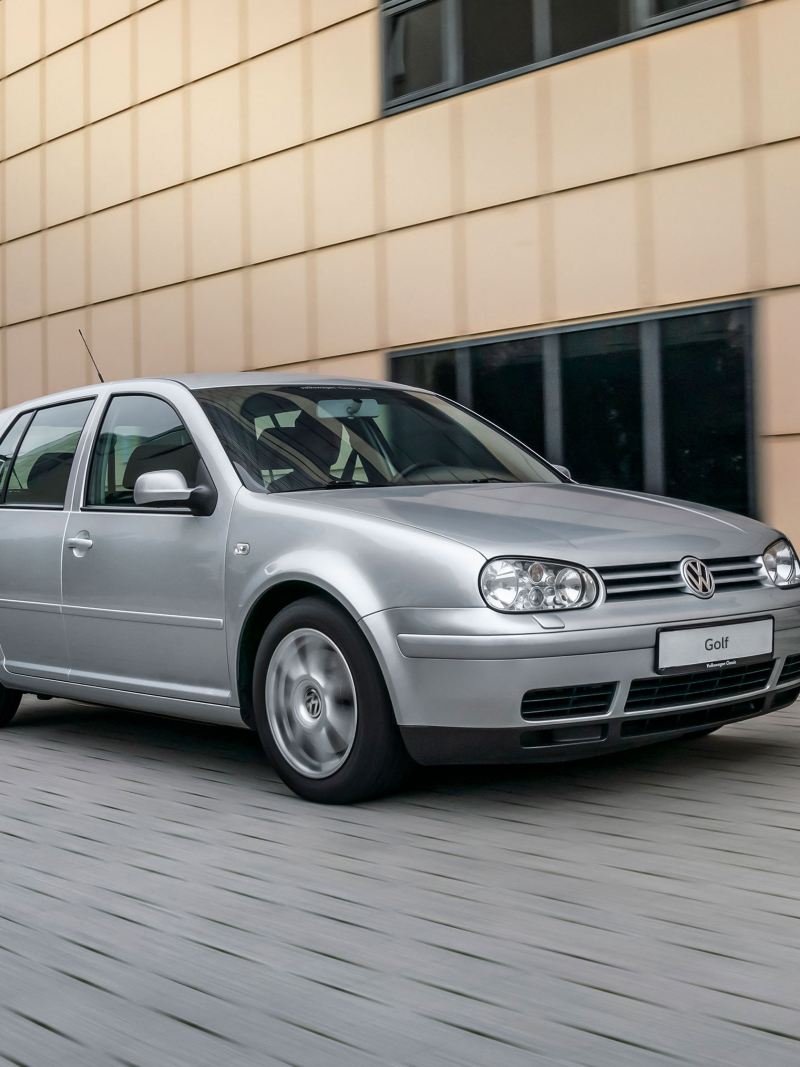 A used compact class car on the road – VW Golf 4