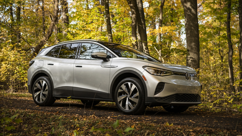 The silver 2023 Volkswagen ID.4 in the forest during fall