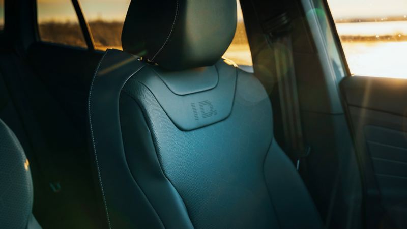 A close up photo of front and rear synthetic vinyl material seats