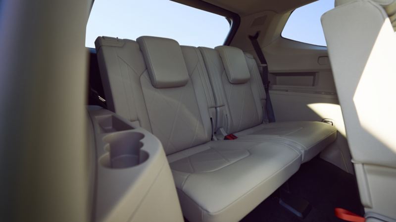 The third row of seats in white in the 2024 Volkswagen Atlas