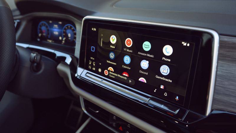 A close-up photo of the new 12" infotainment system featuring wireless Apple CarPlay® and Android Auto™ in the 2024 Volkswagen Atlas