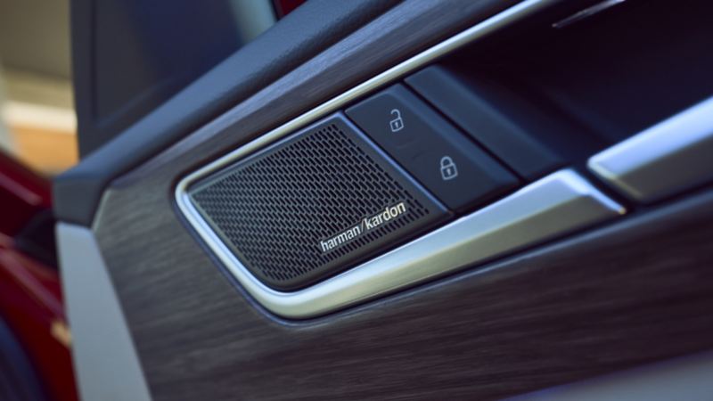 A close-up photo of the Harman Kardon® Premium Audio system in the 2024 Volkswagen Atlas