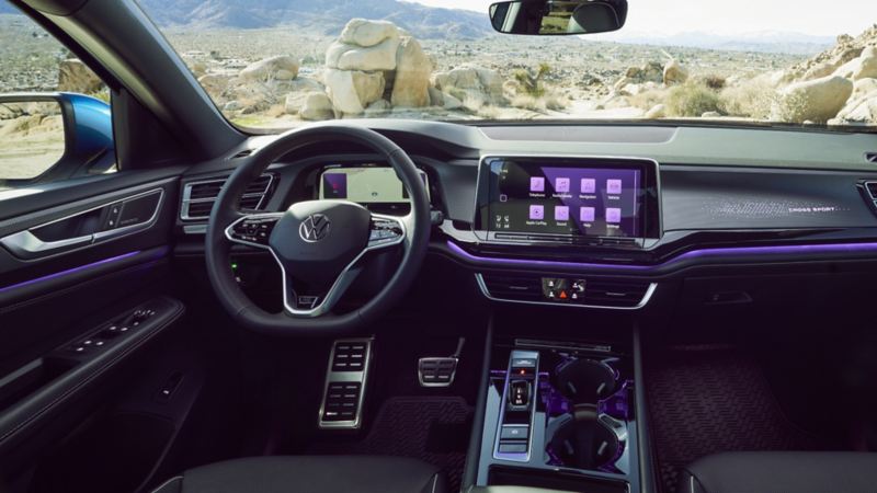 The interior of the 2024 Volkswagen Atlas Cross Sport featuring refined leatherette-trimmed soft-touch dash and centre console.