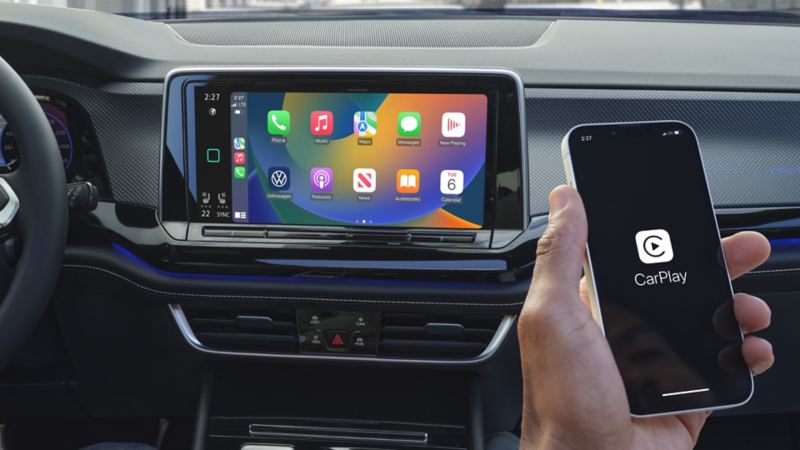 The interior of the 2024 Volkswagen Atlas Cross Sport featuring wireless Apple CarPlay® and Android Auto™