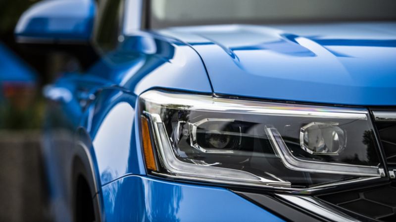 A close-up photo of the 2024 Volkswagen Taos headlight