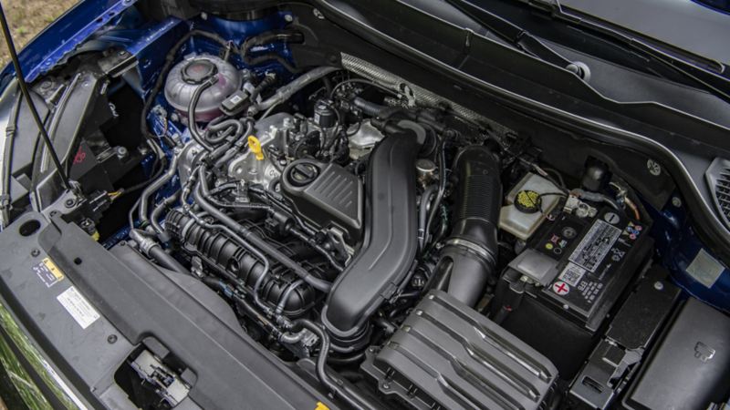 A close up photo of 1.5 TSI® engine with 158 hp and 184 lb-ft of torque in the 2024 Volkswagen Taos