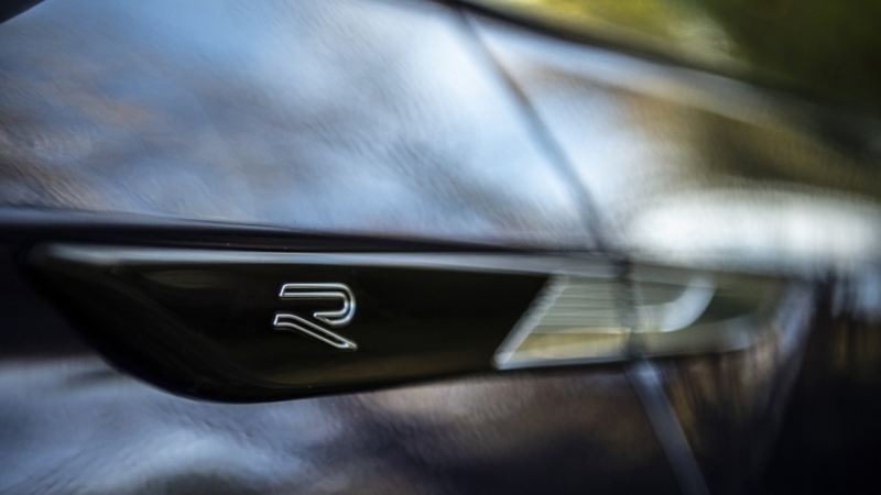 A close-up photo of the R-Line sign on the 2024 Volkswagen Tiguan