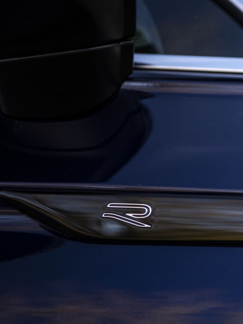 A close-up photo of the R-Line Black Edition sign on the 2024 Volkswagen Tiguan 