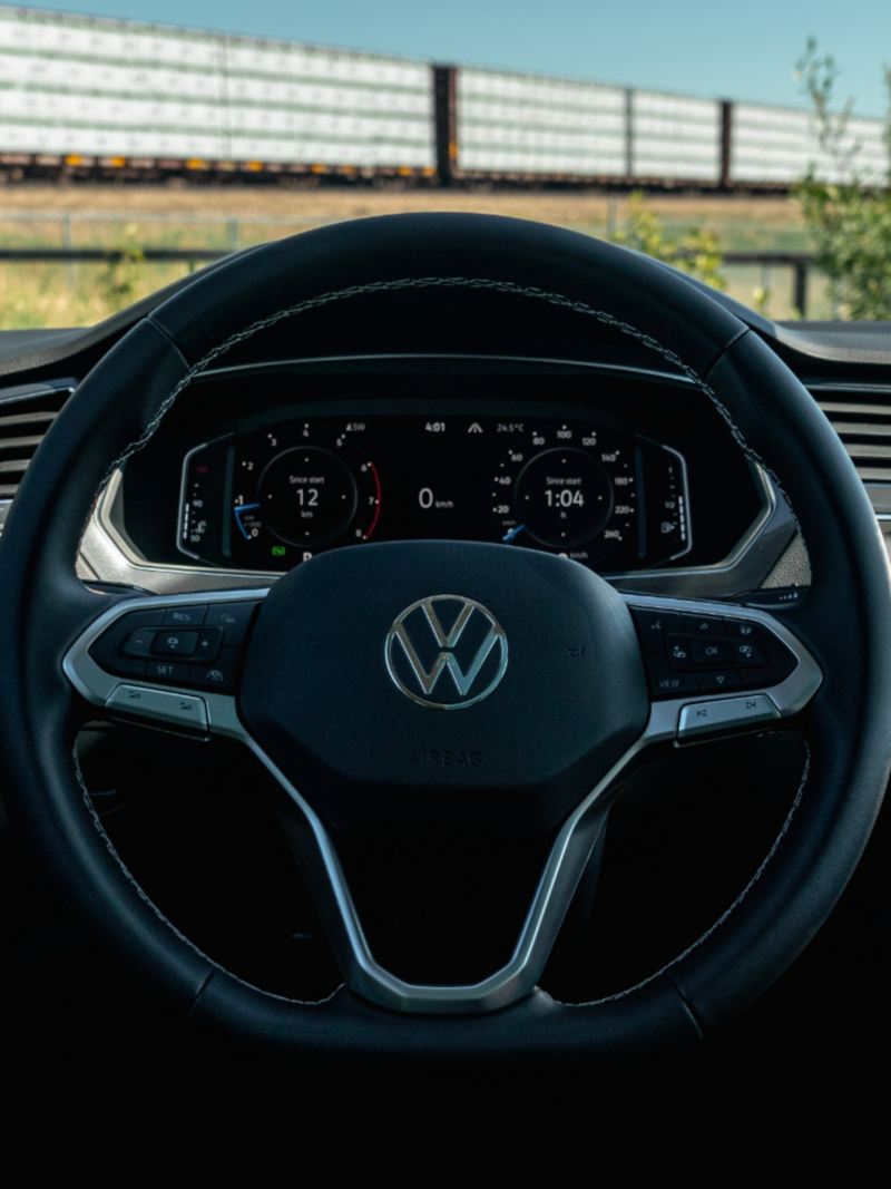 A close-up photo of a steering wheel in the 2024 Volkswagen Tiguan