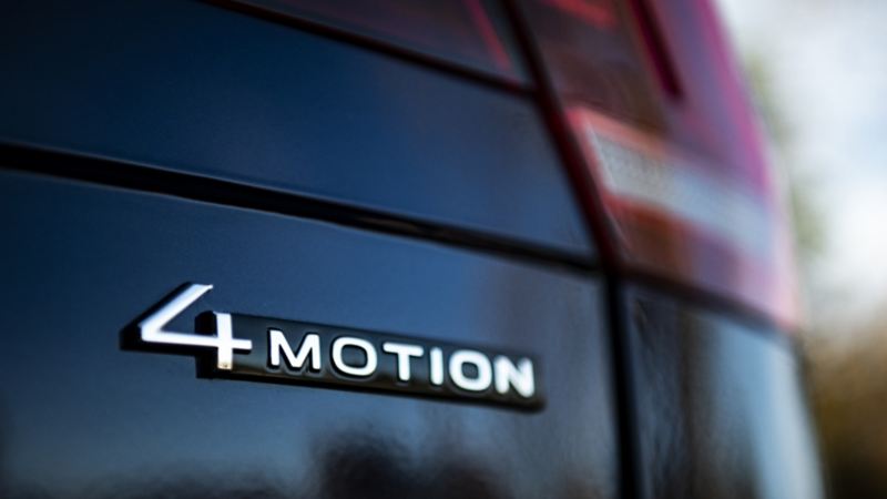 A close-up photo of 4MOTION® All-Wheel Drive sign on the 2024 Volkswagen Tiguan