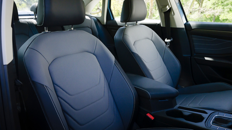 Close-up of the front seats in the 2025 VW Jetta, showcasing the interior design and seat materials.