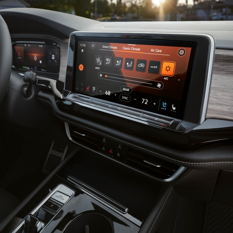 A close-up view of the Atlas 2025's climate control panel, showing its three-zone settings, heated/ventilated front seat controls, and heated steering wheel.