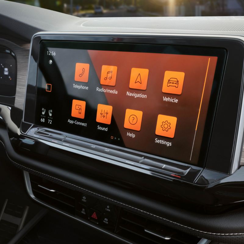 12" Infotainment System in VW Atlas 2025 displaying navigation, music, and phone options on touchscreen.