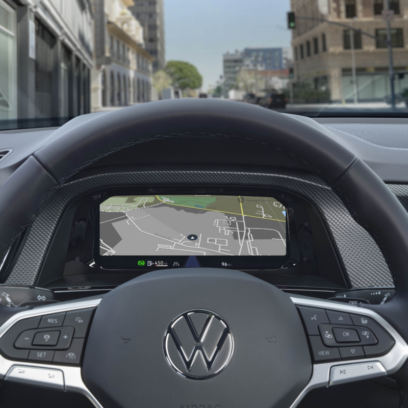 A driver's-eye view of the 2025 Atlas Cross Sport steering wheel, highlighting its ergonomic paddle shifters.