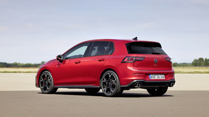 Red Volkswagen Golf GTI showcasing its aerodynamic design.