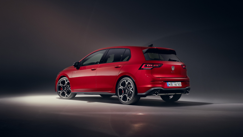 Volkswagen Golf GTI shown from the rear, emphasizing its sporty style.