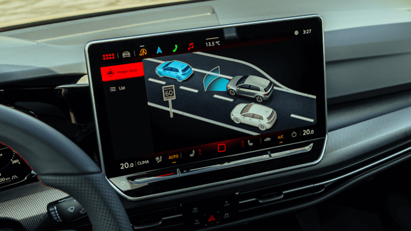 2026 Volkswagen Golf GTI touchscreen showing driving assist visuals and lane detection features. 