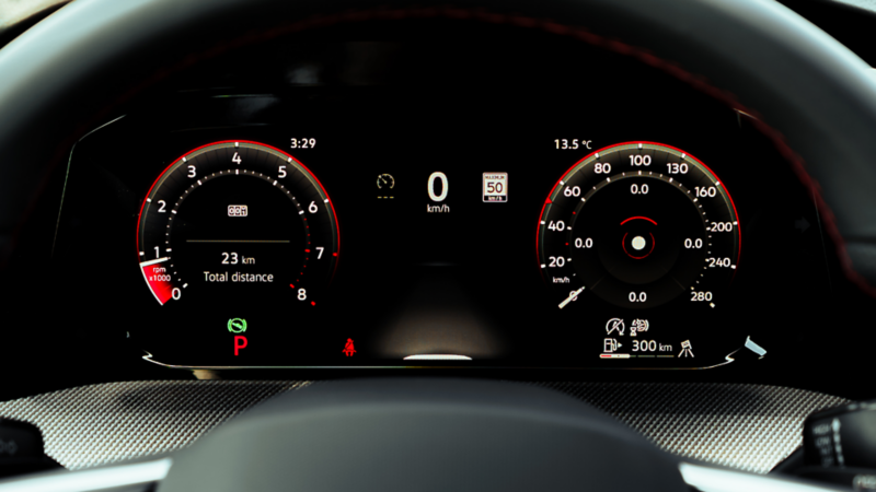 Close-up of the 2026 Volkswagen Golf GTI digital instrument cluster with speedometer, tachometer, and trip data. 