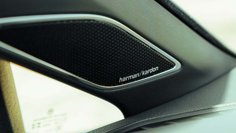 Close-up of Harman Kardon speaker in the 2026 Volkswagen Golf GTI interior. 