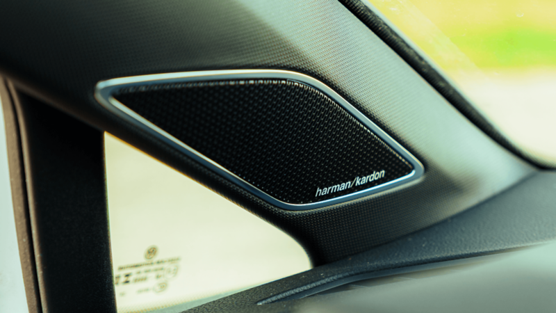 A close-up of the harmon/kardon speaker and logo