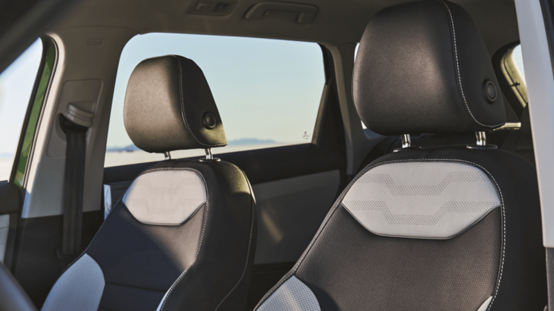 Black and grey two-tone front seats of the 2026 Taos