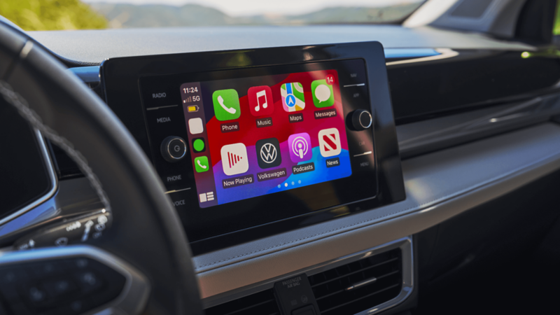 Touchscreen in the 2026 Volkswagen Taos displaying Apple CarPlay and Android Auto interface.