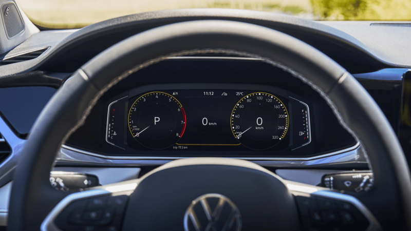 Close-up of the 2026 Volkswagen Taos digital cockpit displaying speedometer and driving data.