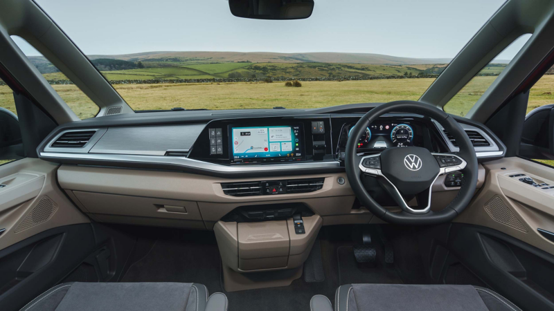interior of a VW cockpit showing the wheel and dashboard
