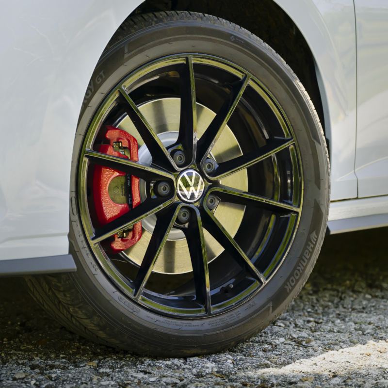 Close-up of a 2025 Jetta GLI sporty wheel with a multi-spoke design in black.