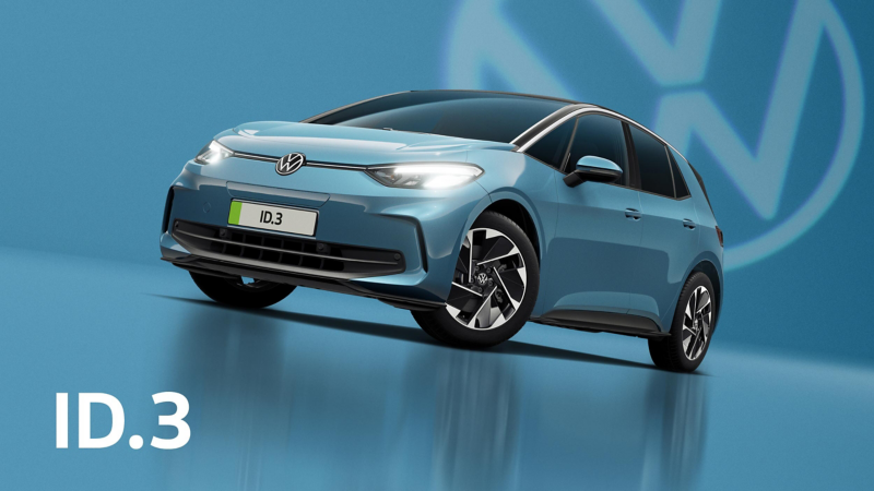 A front three-quarter view of a teal ID.3 set on a teal background with a transparent Volkswagen logo and a charging cable plugged into the charging port