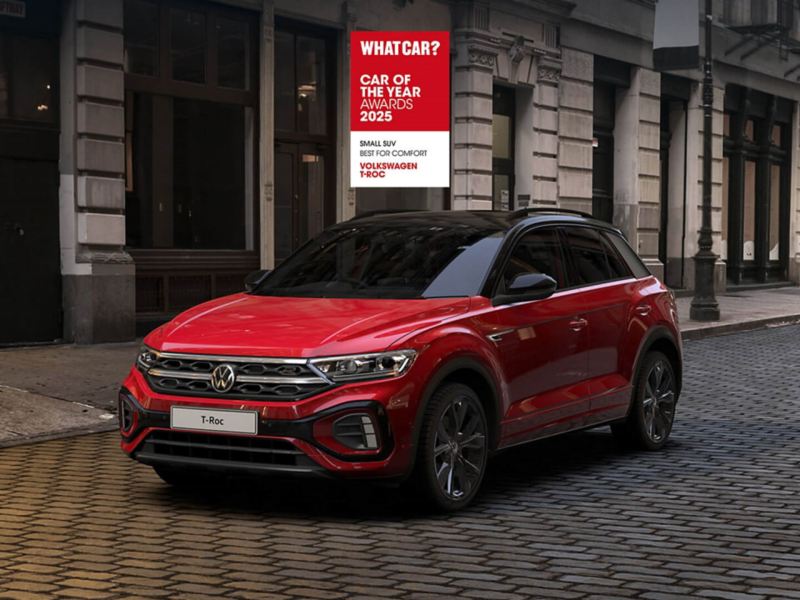 Red T-Roc parked on cobbled city street