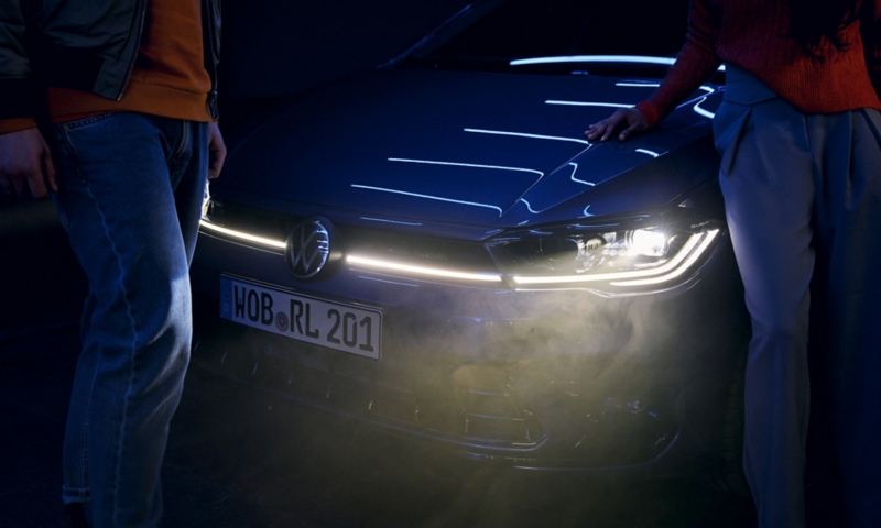 Detailed view of IQ.LIGHT LED matrix headlights on a blue VW Polo R-Line