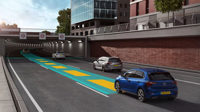 VW Polo moves in road traffic, using the optional Travel Assist.