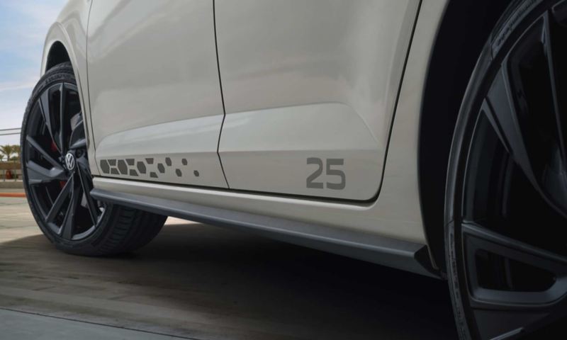 a close up of polo gti with the numbers 25 on the side of the car