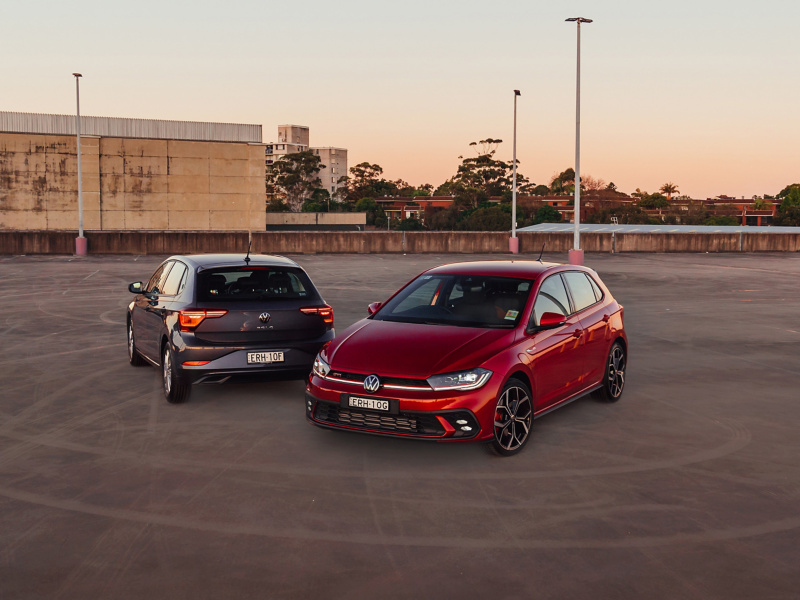 Two VW cars parked closely together