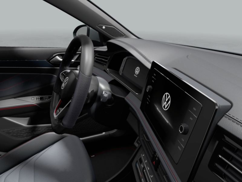 Close-up of the 2025 VW Jetta GLI steering wheel and digital cockpit, highlighting the vehicle's dashboard and controls.