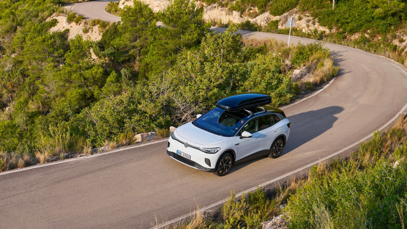 White VW ID.4 with roof box