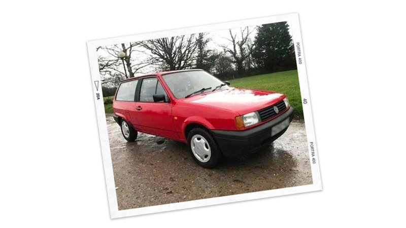 A red Polo parked in the street