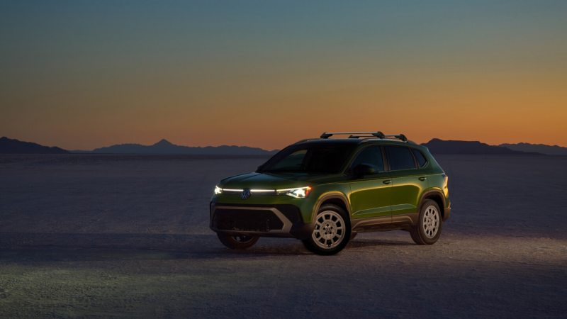 Volkswagen Taos parked at sunset.